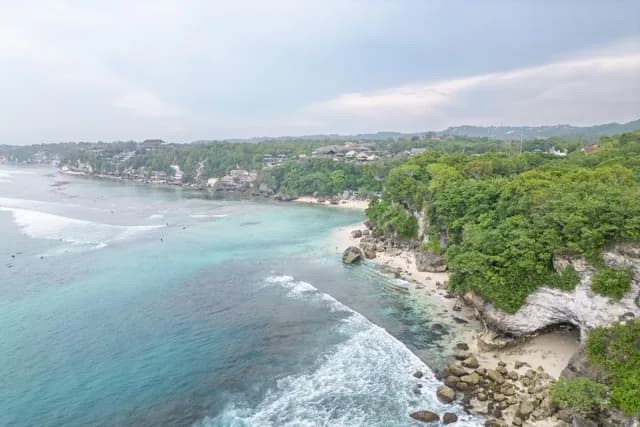 Aerial view of the seashore of Padang Padang Beach on Bali Island.
